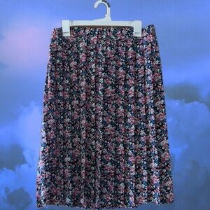 Vintage 1980s pink, black, blue floral pleated knee length skirt.